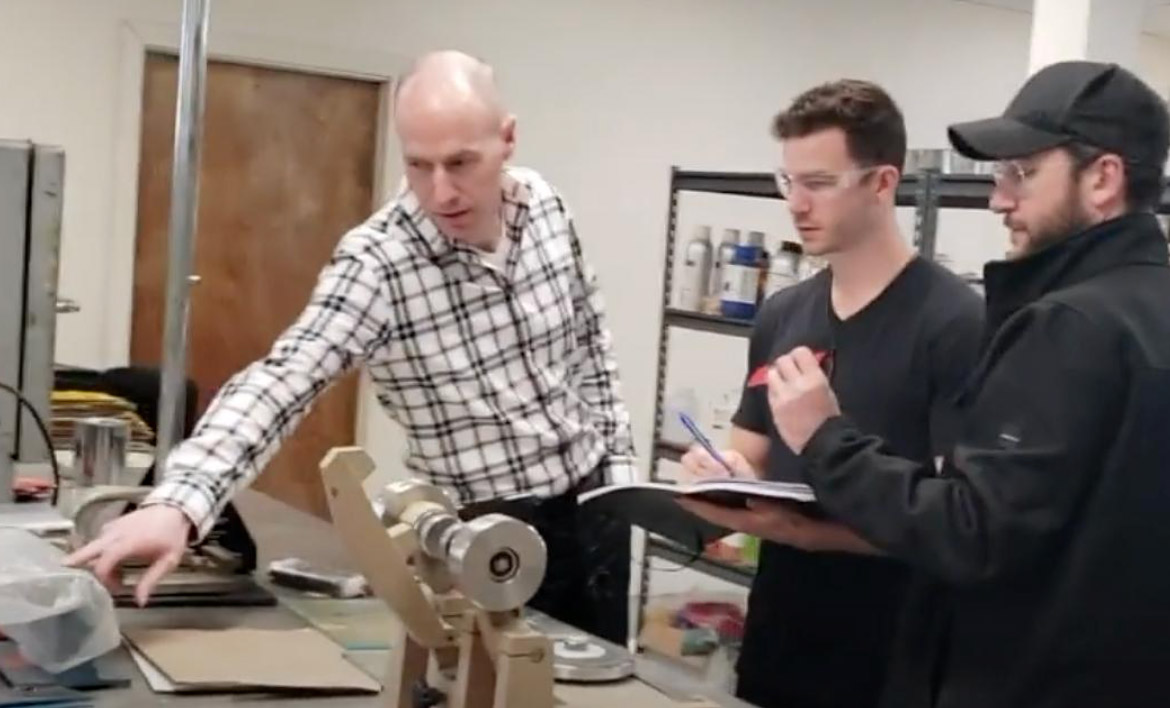 Taylor (middle) in one of Purepave’s Polyurethane R&D Lab, 2017. (Photo by Sanad Nashad)